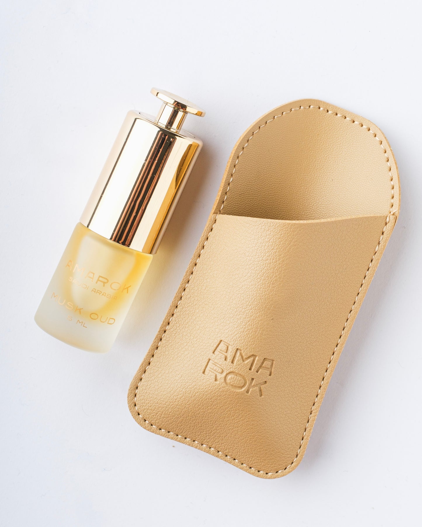 زجاجة مسك عود (5ml) من أماروك – عطر شرقي فاخر في حافظة جلدية